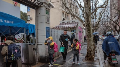 Children arriving for school in Shanghai, China. EPA