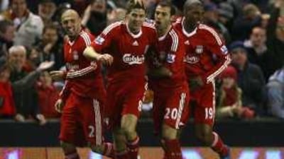 Gerrard celebrates scoring in last night's FA Cup tie.