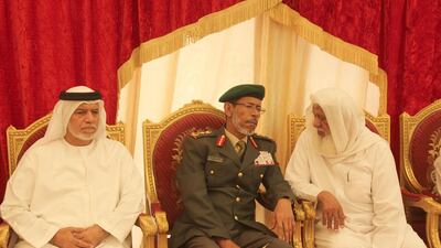 Lt General Hamad Mohammed Thani Al Rumaithi with families of the fallen Emirati soldiers. Wam