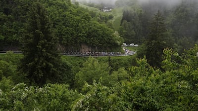 Cyclists pedal during Stage 16, a race between between Livigno to Santa Cristina Val Gardena. AP
