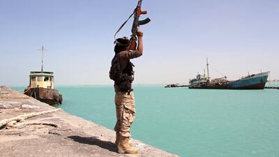 A pro-government fighter at Yemen's Red Sea port of Mokha, where the Saudi-led coalition supporting the government is building cranes to speed up deliveries of humanitarian aid. Saleh Al Obeidi / AFP / February 9, 2017