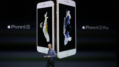 Apple CEO Tim Cook talks about the new iPhone 6S. Monica Davey / EPA