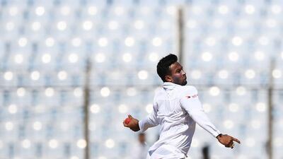 Bangladesh's Shakib Al Hasan bowls during the third day of the first Test against England in Chittagong on Saturday. Dibyangshu Sarkar / AFP / October 22, 2016