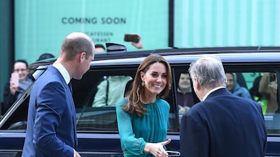 Britain's Prince William, Duke of Cambridge and Britain's Catherine, Duchess of Cambridge are greeted by Prince Shah Karim Al Hussaini, Aga Khan IV on arrival for a visit to the Aga Khan Centre in London on Wednesday, October 2, 2019. AFP