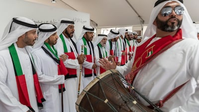 Emiratis, members of the Al Dhuhoori Tribe from between Sharjah and Ras Al Khaimah, prepare for the parade.