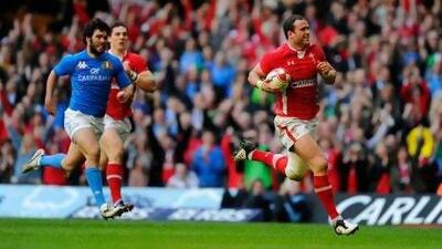 Jamie Roberts scores the first try for Wales against Italy in their victory in Cardiff.