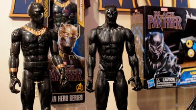 Black Panther toys are displayed to attendees at the Hasbro showroom during the annual New York Toy Fair, on February 20, 2018, in New York. Panther claws, masks and action figures are leaping off store shelves after runaway hit "Black Panther" -- the first film in the Marvel universe focused on a black superhero -- shredded box office expectations with a massive opening weekend. AFP