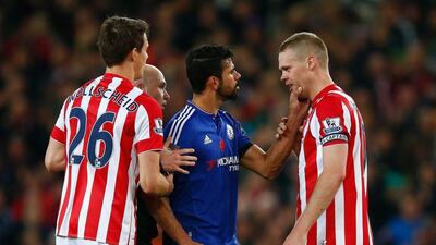 Diego Costa of Chelsea argues with Ryan Shawcross of Stoke City after their Premier League contest on Saturday at the Britannia Stadium. Laurence Griffiths / Getty Images