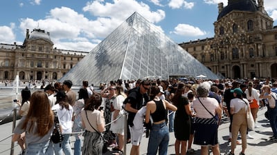 Tourists at the Louvre Museum in Paris. Europe is leading the rebound in international tourism, welcoming 68 per cent of the world's 700 million tourists in the January-September period. Reuters