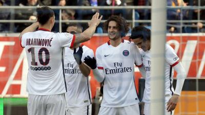 Paris Saint-Germain’s Edison Cavani (R), Zlatan Ibrahimovic (L) and Adrien Rabiot celebrate after a goal against Troyes. REUTERS/Philippe Wojazer