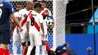 France's Samuel Umtiti reacts after sustaining an injury. Damir Sagolj / Reuters