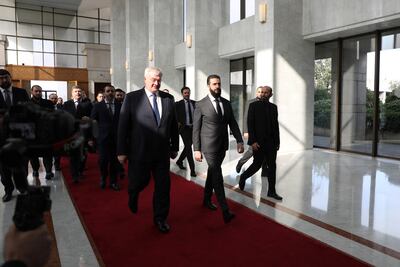 Ahmed Al Shara, right, leading Syria's interim government, with Ukrainian Foreign Minister Andrii Sybiha in Damascus. Getty Images