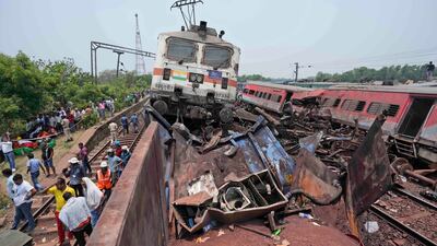 The June crash occurred when a passenger train was mistakenly diverted on to an adjacent line, where it struck a stationary freight train. AP