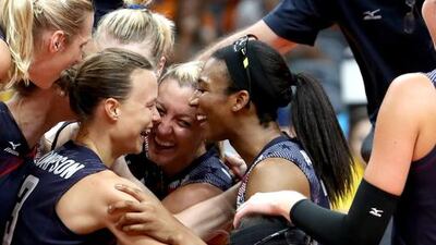 Courtney Thompson, Jordan Larson-Burbach, Foluke Akinradewo, Kelsey Robinson, Rachael Adams of United States celebrate after match point during the women’s bronze medal match between Netherlands and the United States on Day 15 of the Rio 2016 Olympic Games at the Maracanazinho on August 20, 2016 in Rio de Janeiro, Brazil. Phil Walter / Getty Images