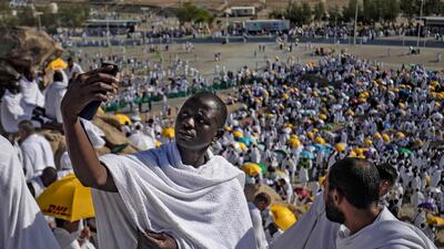 A Muslim pilgrim takes a 'selfie' picture atop Mount Arafat, also known as Jabal al-Rahma (Mount of Mercy), southeast of the holy city of Mecca, during the climax of the Hajj pilgrimage. AFP