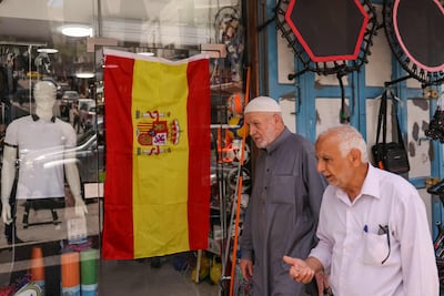 The flag of Spain in a shop window in the city centre of Hebron in the occupied West Bank. AFP