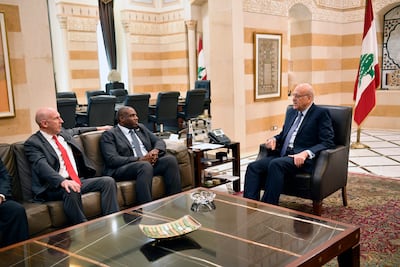 Lebanese caretaker Prime Minister Najib Mikati meets with British Foreign Secretary David Lammy and Defence Secretary John Healey at the Foreign Ministry in Beirut. EPA