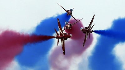 The Red Arrows, Britain’s Royal Air Force aerobatic team, performs at the Dubai Airshow. Karim Sahib / AFP