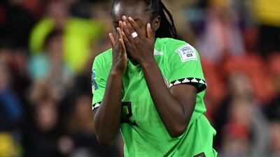 Michelle Alozie of Nigeria reacts after Chloe Kelly of England hit the winning penalty. EPA