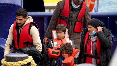 Migrants arrive in Dover on June 21, 2022. PA