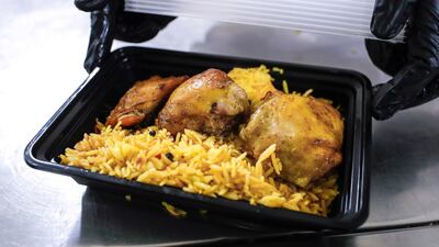 A box of rice and chicken.