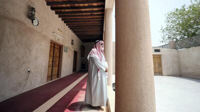 Imam Najmulhuda Nadvi stands outside Zaid Bin Thabit Mosque, one of the oldest in Sharjah. Chris Whiteoak / The National