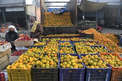 Vendors wait for customers at a wholesale fruit and vegetable market in Ghaziabad city in northern India. The country loses a staggering 67 million tonnes or 30 per cent of agricultural produce because of poor storage and transport. AFP