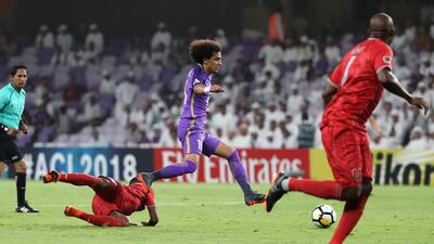 Al Ain's Omar Abdulrahman, centre, will be crucial to his team's chances of qualifying for the last eight. Karim Sahib / AFP