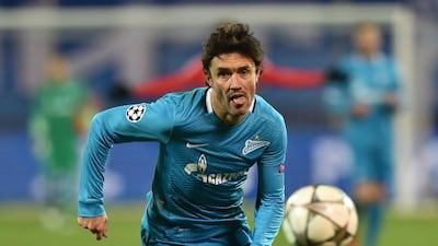 Zenit’s midfielder Yuri Zhirkov eyes the ball during the second-leg round of 16 Uefa Champions League football match FC Zenit vs SL Benfica at the Petrovsky stadium in St Petersburg on March 9, 2016. AFP PHOTO / KIRILL KUDRYAVTSEV