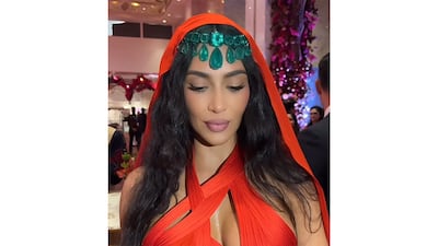 Kim Kardashian wore Lorraine Schwartz emeralds for Day 2 of the wedding. Photo: Julia Chafe / Instagram