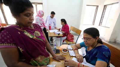 An indian voter gets her finger inked at a polling station before casting her vote during the sixth phase of the Indian parliamentary election in Bhopal, India. EPA