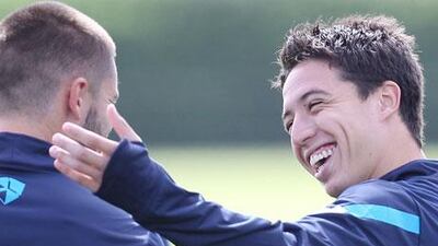 Arsene Wenger has no hesitation about playing Samir Nasri, right, who has expressed a desire to leave Arsenal.