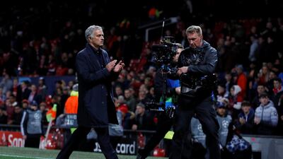 Manchester United manager Jose Mourinho applauds fans after the match. Reuters