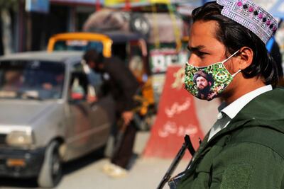 A member of the Taliban at a checkpoint along a street in Jalalabad on Tuesday. AFP