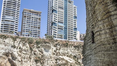 Andy Jones of the USA dives from the 25m cliff in Raouche during the first competition day of the fifth stop of the Red Bull Cliff Diving World Series. Getty Images