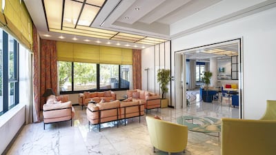 The interior is predominantly black and white with a pop of colour here and there.