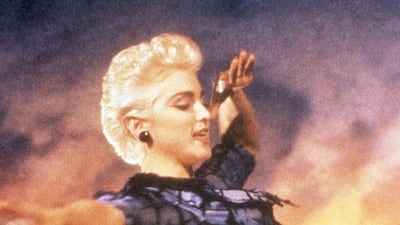 Madonna, with short blonde hair in the video for True Blue, 1988. Rex