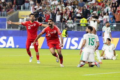 Jordan midfielder Nizar Al Rashdan celebrates opening the scoring against Algeria. EPA