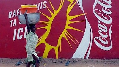 Signs such as this one in the capital of the Republic of Mali helped Coca-Cola become the world's most recognisable brand in 2011. Debbie Egan-Chin / Getty Images