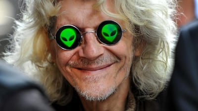 A passerby looks on as US Senator Bob Corker leaves Trump Tower after meeting with presumptive Republican presidential nominee Donald Trump. Timothy A Clary / AFP Photo