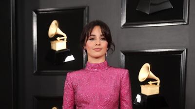 Camila Cabello in high-necked Armani Prive (how very Jane Fonda of her). Photo: Reuters