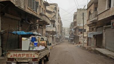 Syrians flee the rebel-held town of Ariha in the northern countryside of Syria's Idlib province following an air strike by pro-regime forces. AFP