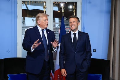 US President Donald Trump, left, and French President Emmanuel Macron discussed the future of the Hormuz Strait at the G7 summit in Evian-les-Bains. EPA