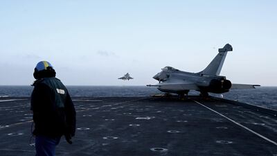 Rafale jet fighters taking off from the French aircraft carrier Charles de Gaulle on January 23. EPA