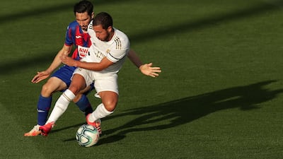 Eden Hazard of Real Madrid battles for possession, before being taken off. Reuters