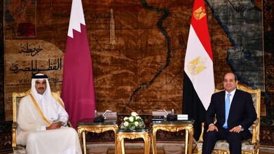 Emir of Qatar Sheikh Tamim bin Hamad Al Thani, left, met with Egyptian President Abdel Fattah El Sisi in Cairo on June 25. Egyptian Presidency