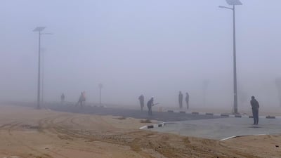 Dense fog did not deter them from playing the sport. Pawan Singh / The National