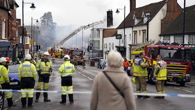 Firefighters continue to deal with the fire. PA