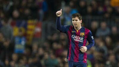 Lionel Messi and Barcelona lead Real Madrid by four points in the La Liga title race. Alejandro Garcia / EPA / April 8, 2015