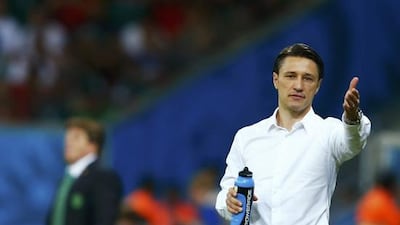 Croatia coach Niko Kovac gestures in front of Mexico coach Miguel Herrera during their 2014 World Cup Group A match at the Pernambuco Arena in Recife on June 23, 2014. Eddie Keogh / Reuters